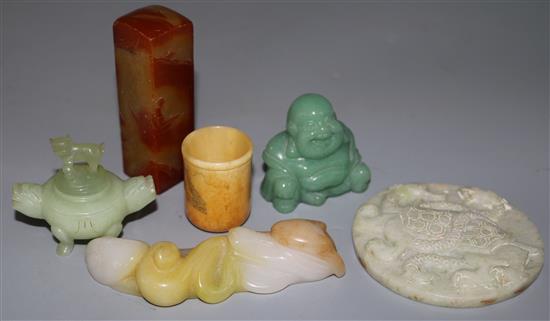 Four Chinese jadeite or hardstone carvings and a bone cup